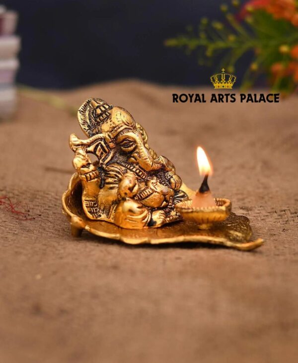 Lord Ganesh Ji Idol for Home with Deepak on Leaf