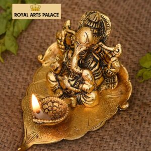 Lord Ganesh Ji Idol for Home with Deepak on Leaf