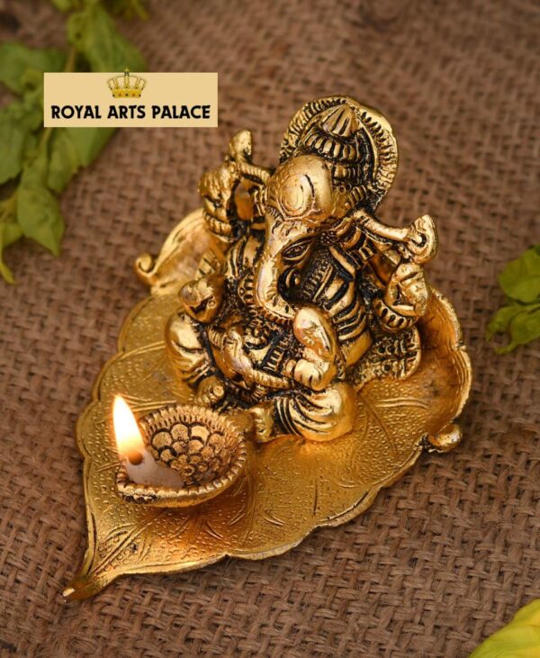 Lord Ganesh Ji Idol for Home with Deepak on Leaf